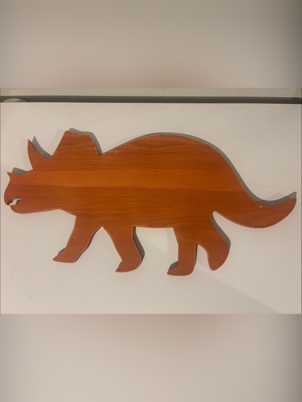 Hobby Lobby Wooden Triceratops Wall Art in Warm Orange